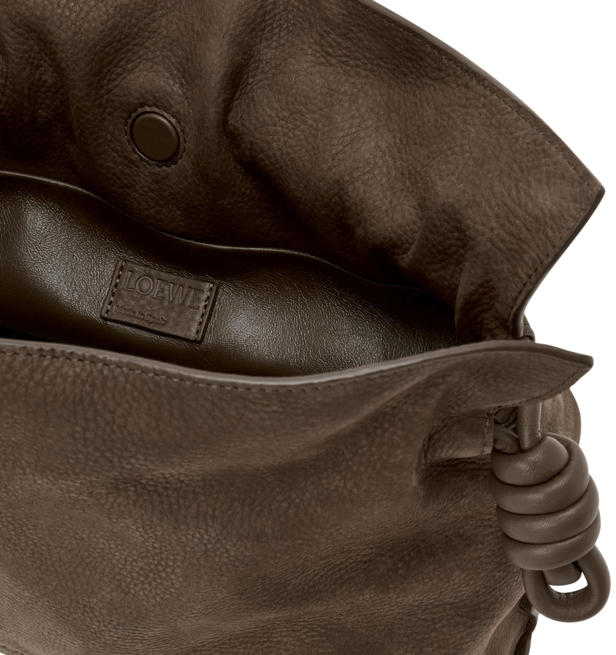 Image 4 of 4 - BROWN - Loewe Medium Flamenco Clutch is crafted from grained nubuck and features the brand's signature soft, slouchy silhouette with a cinched closure and iconic knot drawstrings. Designed for shoulder, crossbody, or hand carry with a detachable and adjustable strap, discreet magnetic closure, nappa lambskin lining, and embossed LOEWE logo. Main Material: Grained Nubuck. Lining: Nappa Lambskin. Dimensions: 30 cm W 24.5 cm H 10.5 cm D. Strap Length: 96-120 cm. Strap Drop: 38-44 cm. Weight: 0