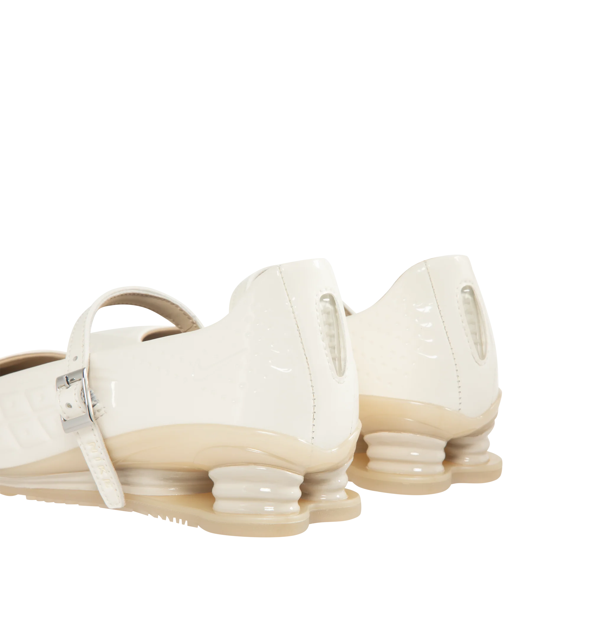 Image 3 of 5 - NEUTRAL - Nike Womens Shox Z Calistra Sneakers feature a molded synthetic leather upper. Designed with an adjustable midfoot strap, Nike Shox Z cushioning pillars, signature Nike and Shox branding, and durable rubber outsole. Upper: Synthetic Leather; Cushioning: Nike Shox Z; Outsole: Rubber. Imported