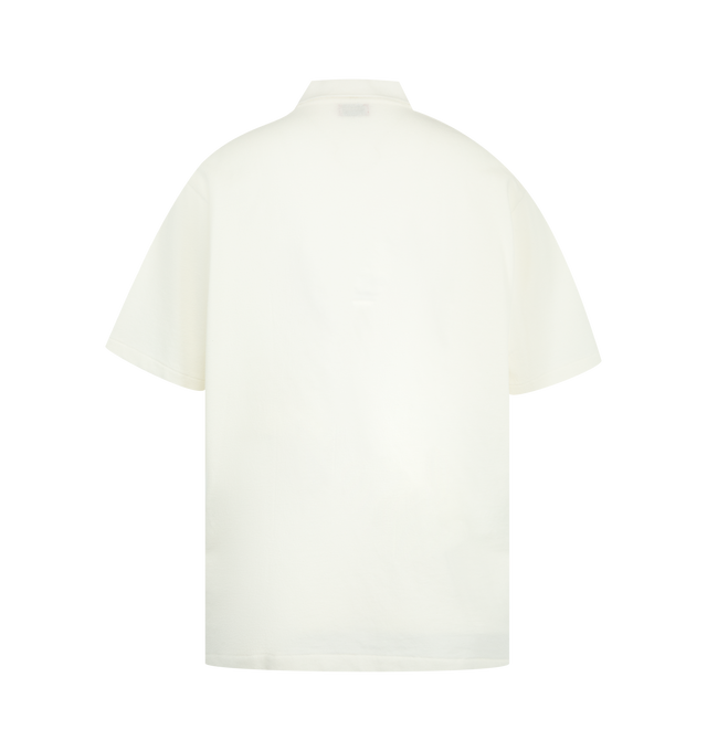 Image 2 of 2 - WHITE - HUMAN MADE Polo Shirt featuring a wide fit, single heart patch on the left chest, short sleeves, polo collar and shell-like buttons with the brand logo. 100% cotton. Made in Japan.