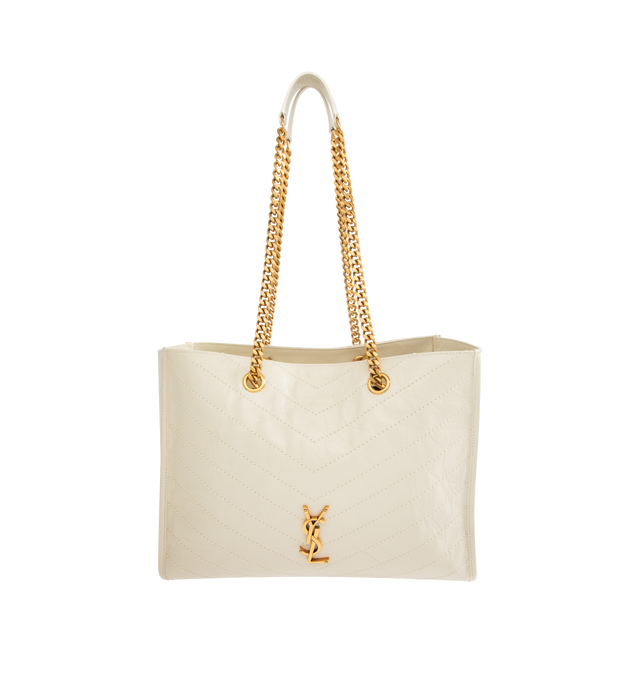 Image 1 of 3 - WHITE - SAINT LAURENT Niki Shopping Bag in vintage leather featuring vintage calfskin, chevron topstitching, cotton lining, bronze-tone hardware, magnetic snap-button closure and one zip pocket. 13" x 10.6" x 5.5". Strap drop: 10.6". Calfskin. Made in Italy.