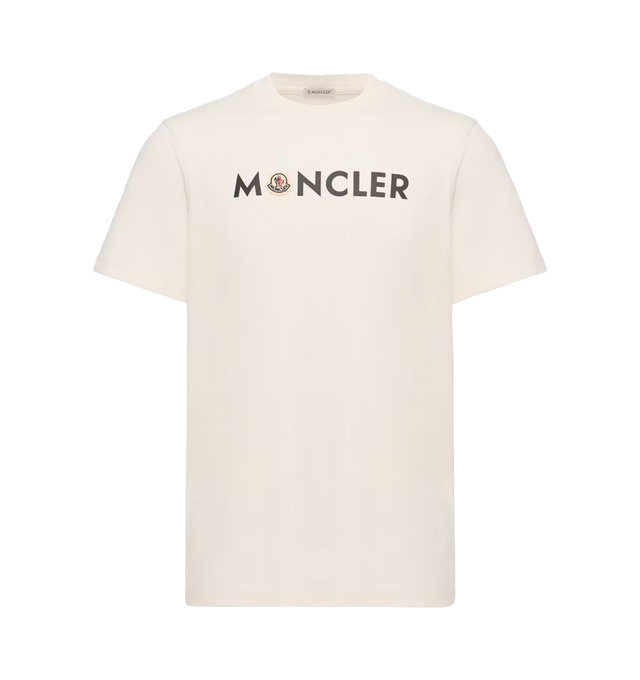 Image 1 of 1 - NEUTRAL - Moncler Mens Logo Cotton T-Shirt is crafted from cotton jersey. Features a regular fit, crew neck, short sleeves, logo print, and logo patch. Base Fabric: 100% Cotton; Collar Rib: 100% Cotton. Made in Turkey.