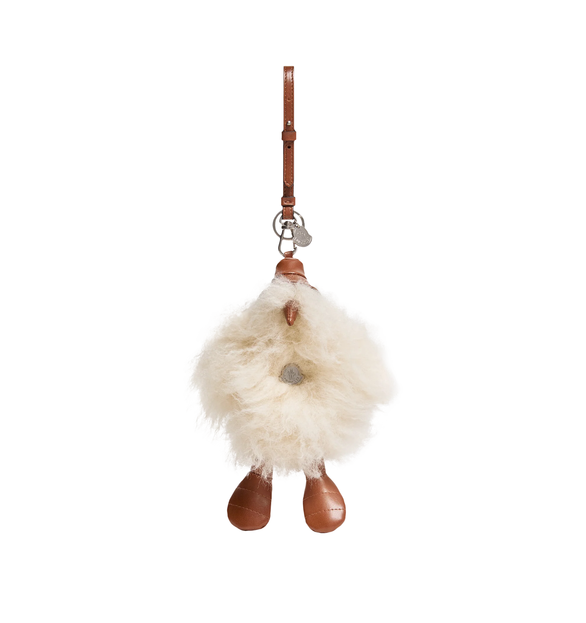 Image 1 of 1 - NEUTRAL - The Moncler MonDuck Key Ring is inspired by the brands MonDuck character, this key holder is shaped in a playful duck silhouette. Crafted from fluffy fabric with contrasting details, the accessory features a strap with a carabiner and metal ring, making it easy to attach to bags or keys. A metal logo tag completes the design. Main material: 100% Polyester. Made in Italy. 