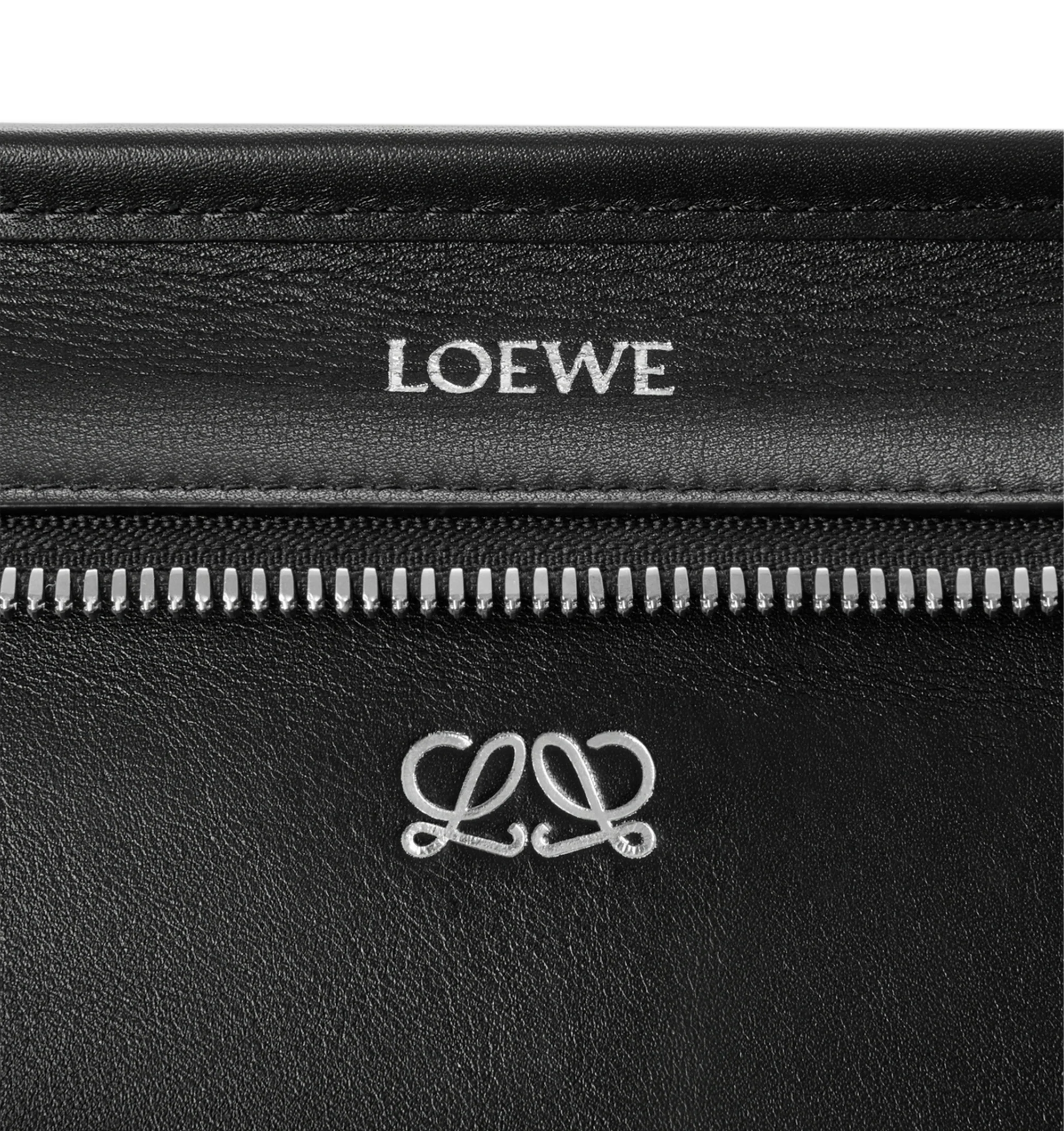 Image 12 of 14 - BLACK - Loewe Women's Medium Amazona 180 Bag is crafted from woven nappa calfskin and features a relaxed silhouette inspired by one of the house's iconic designs. Designed with a single Toron top handle and removable shoulder strap, it can be carried by hand, over the shoulder, or crossbody. A concealed magnetic closure, zip fastening with dual leather pullers, two compartments, an internal flat pocket, and a side D-ring provide functional organization. Finished with palladium-tone hardware 