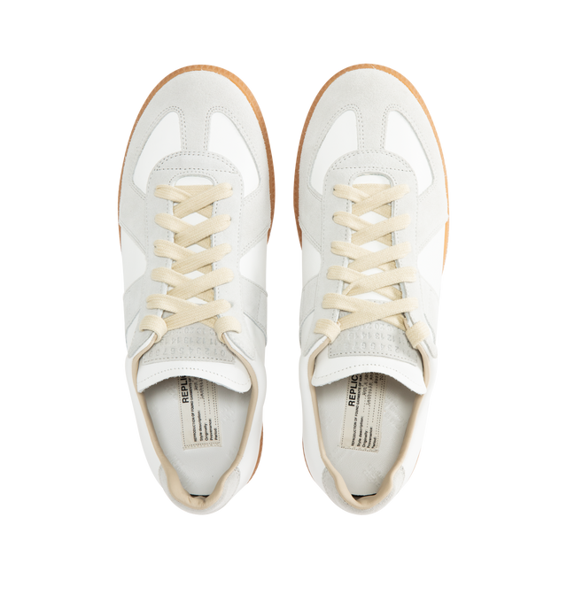 Image 5 of 5 - WHITE - MAISON MARGIELA High Quality Luxury Sneakers featuring lace-up sneakers in buffed nappa calfskin and calfskin suede, contrasting sole, Maison Margiela logo label on the tab, internal High Quality Luxury label, internal elastic and all-over Maison Margiela logo insole. 100% calf leather. Sole: 100% rubber. Made in Italy.
