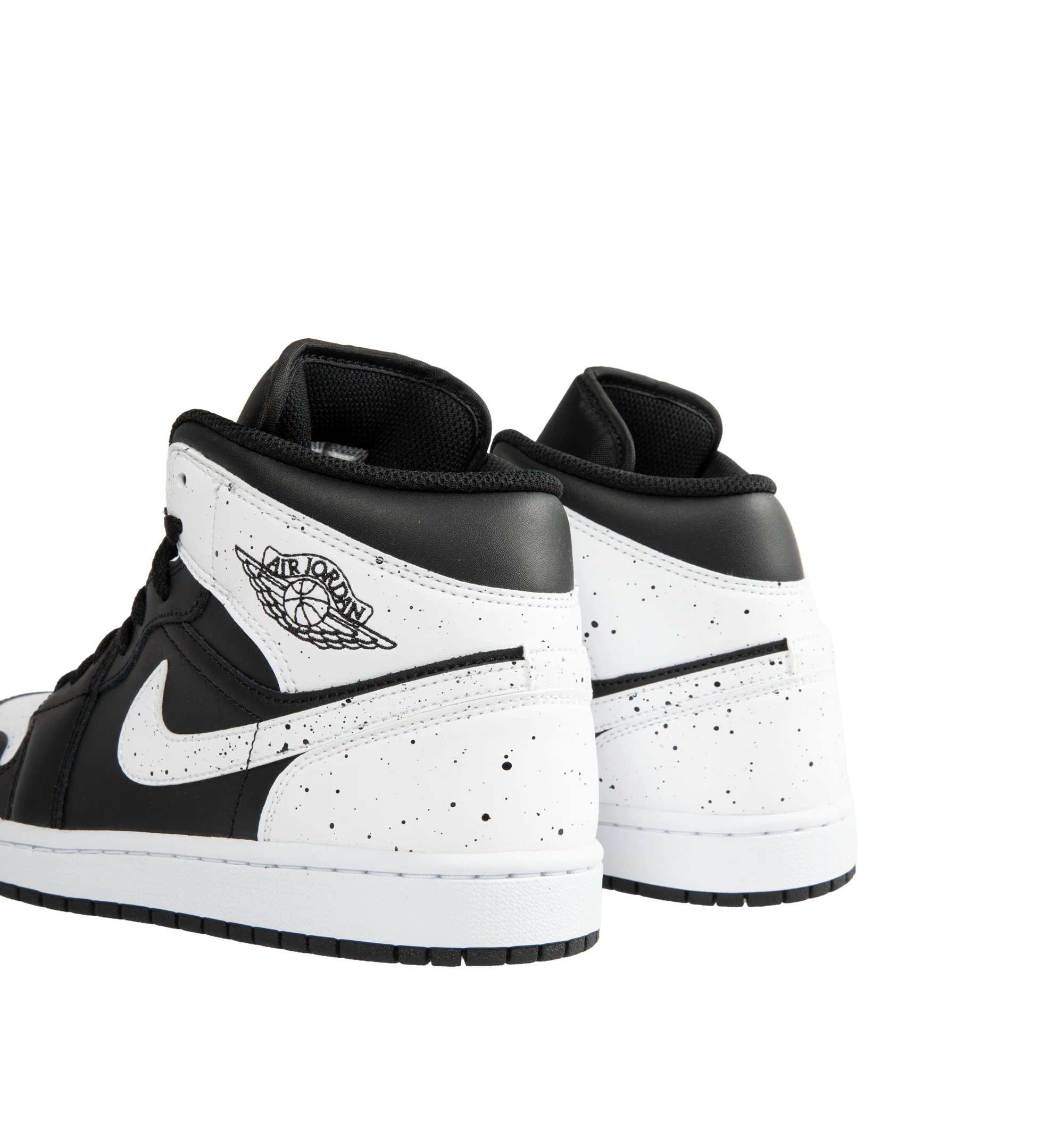 Image 3 of 5 - MULTI - Jordan Men's Air Jordan 1 Mid SE Sneakers feature a black and white upper crafted from genuine leather and textile. The mid-top silhouette is accented with a Wings logo at the collar and a Jumpman logo on the tongue, while an encapsulated Nike Air-Sole unit provides lightweight cushioning. Upper: Genuine Leather and Textile. Sole: Rubber.