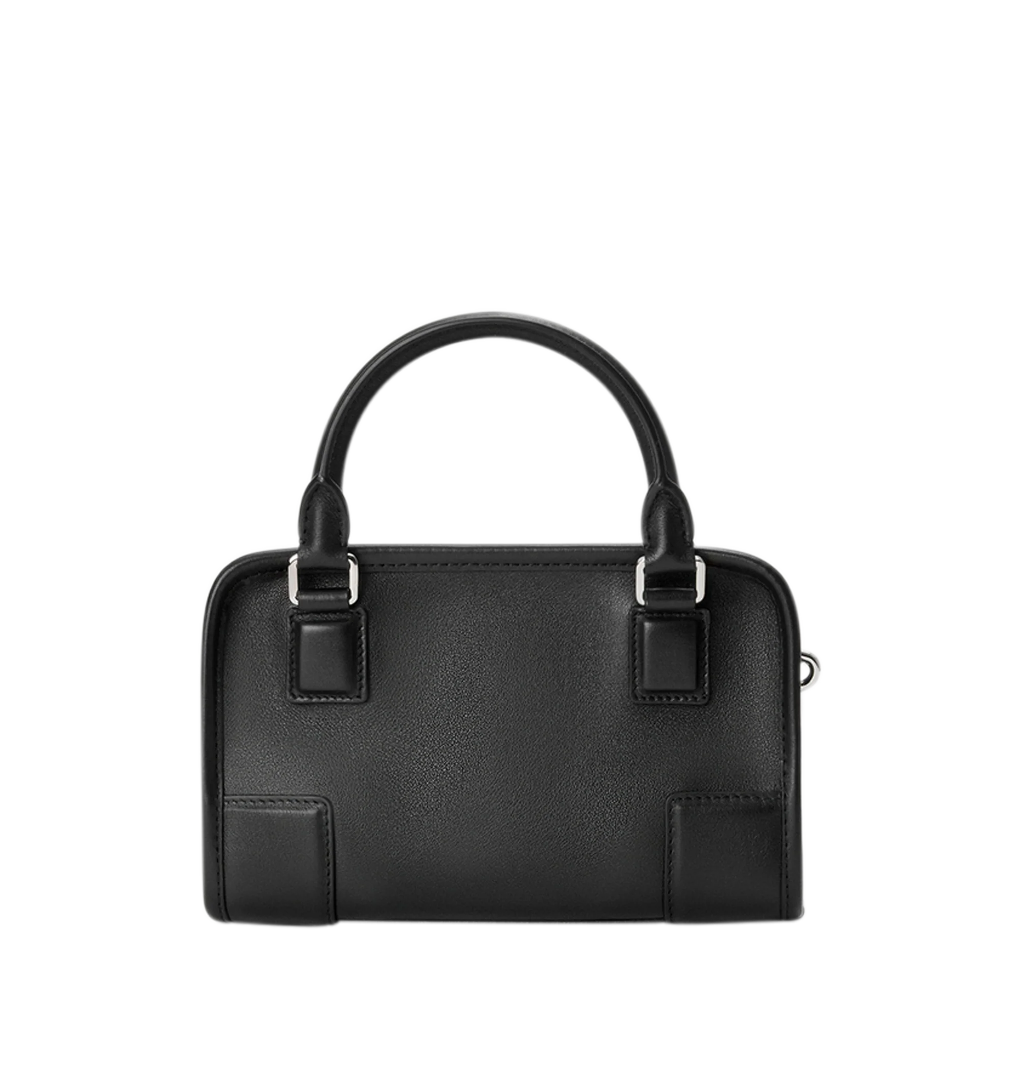 Image 5 of 11 - BLACK - Loewe Mini Amazona 180 Bag in leather features a relaxed silhouette anchored by a single toron top handle, designed to be carried open, while a concealed closure secures the main compartment, removable shoulder and crossbody straps, two carry options: short handle, removable and adjustable crossbody strap, zip closure with two leather zip pullers, two compartments, main compartment closed with magnetic closure, left side d-ring for customization, suede and nappa lambskin lining, and  