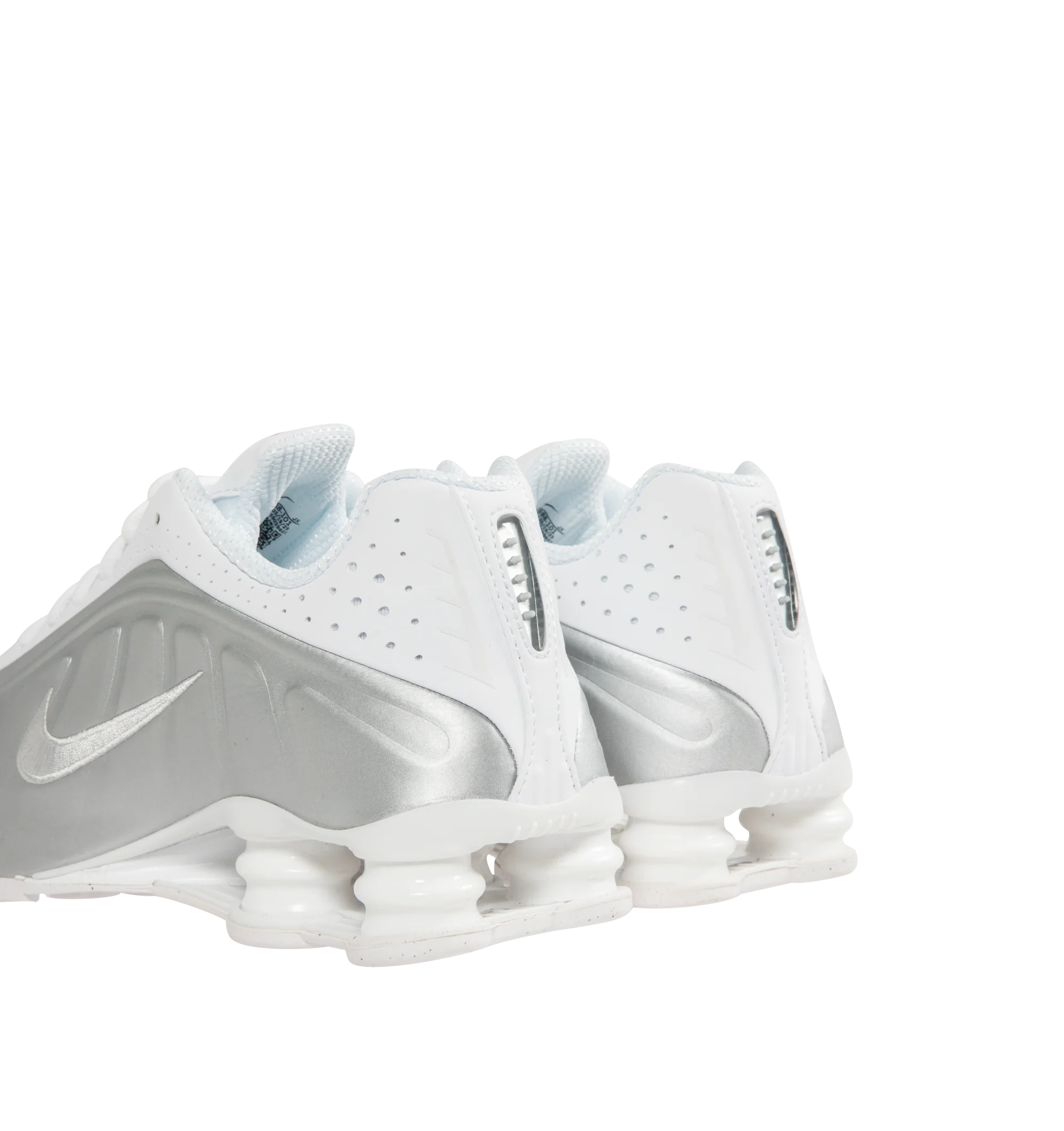 Image 3 of 5 - WHITE - Nike Womens Shox Magia Sneakers feature a premium leather and textile upper. Designed with a lace-up closure, metallic accents, Total 90-inspired detailing, Nike Shox cushioning columns, and durable rubber outsole. Upper: Leather and Textile; Cushioning: Nike Shox; Outsole: Rubber. Imported