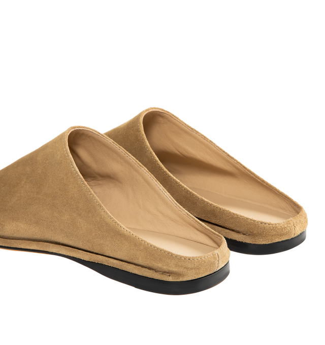 Image 3 of 4 - BROWN - THE ROW Piper Slide featuring Artisanally-crafted slip-on shoe in soft calfskin suede with square toe, outer stitch detailing, soft nappa leather lining, and leather sole. 100% calfskin suede. Made in Italy.