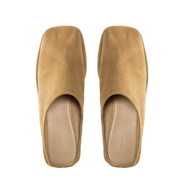 Image 4 of 4 - BROWN - THE ROW Piper Slide featuring Artisanally-crafted slip-on shoe in soft calfskin suede with square toe, outer stitch detailing, soft nappa leather lining, and leather sole. 100% calfskin suede. Made in Italy.