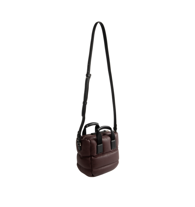 Image 2 of 3 - RED - Moncler Womens Micro Caradoc Shoulder Bag is crafted from leather exterior with signature horizontal boudin quilting. Features cotton drill lining, padded construction, ribbon top handles with leather grip, adjustable and detachable leather shoulder strap, zip closure, and metal Moncler logo. Lining: 100% Cotton; Padding: 90% Down, 10% Feather; Leather Exterior: Cow Leather. Dimensions: 16.5cm L x 13cm H x 8cm D. Made in Italy. 