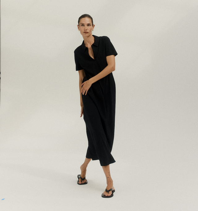 Image 2 of 5 - BROWN - The Row Refined flip flop sandal in shiny calfskin leather with stitched leather detailing and lightly treaded sole. 100% Calfskin Leather. Made in Italy. 