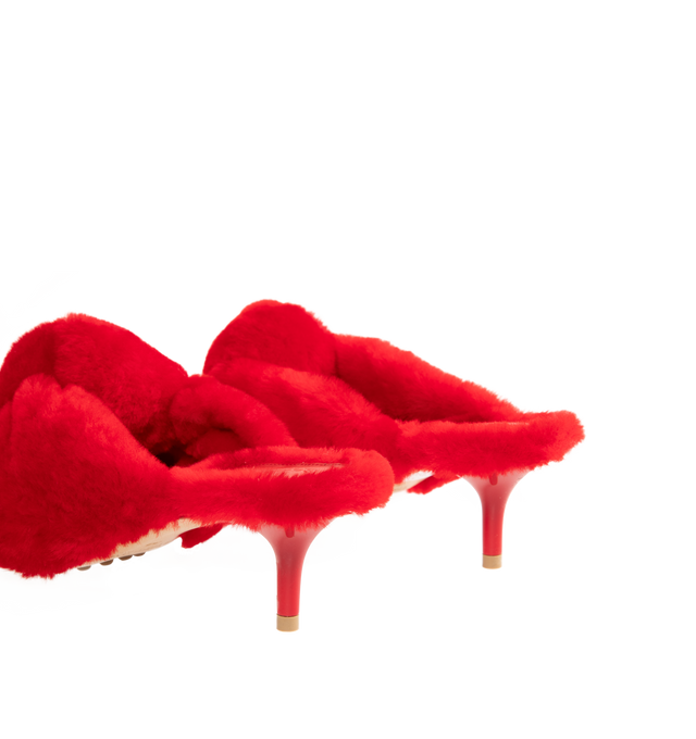 Image 4 of 5 - RED - BOTTEGA VENETA Cherry Mule featuring kitten heel mule sandal in soft merino shearling and a cushioned signature knot detail. Merino shearling. Lining: lambskin. Rubber-injected leather outsole. Made in Italy.