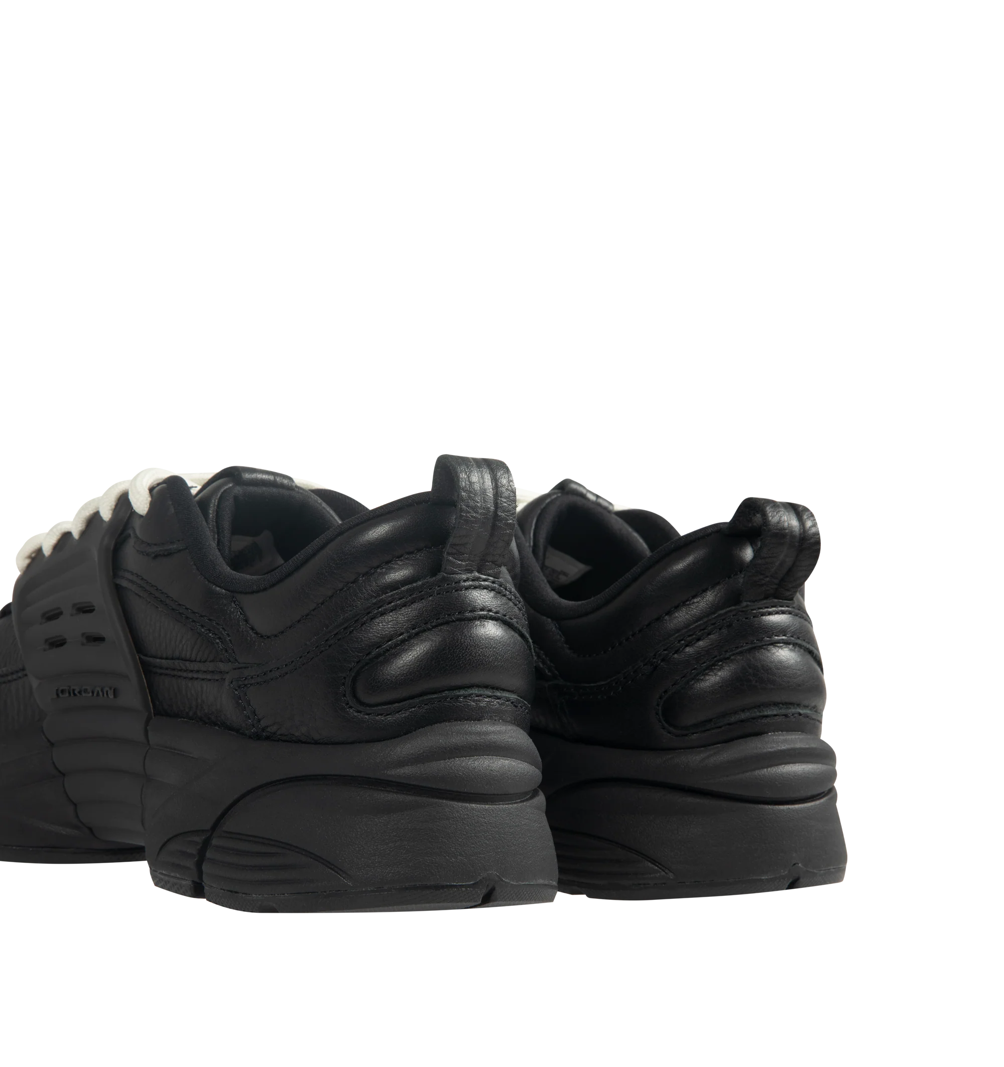 Image 3 of 5 - BLACK - Men's Jordan Trunner O/S SP Sneakers feature a leather upper with synthetic overlays, molded midfoot support wings, and signature Jordan branding for a modern athletic look. These lifestyle sneakers combine responsive Cushlon 3.0 foam cushioning, a lightweight foam midsole, and a durable rubber outsole for exceptional comfort, stability, and everyday traction. Main Material: Leather and Synthetic. Midsole: Foam with Cushlon 3.0 Cushioning. Sole: Rubber.