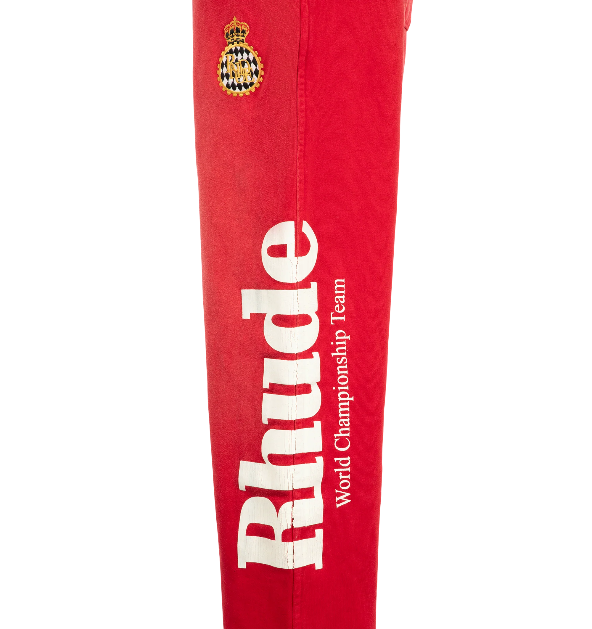 Image 3 of 4 - RED - Rhude Desert Racing Script Cuffed Sweatpant is crafted from cotton and features a relaxed silhouette with elasticated cuffs for a tapered fit. Designed with Desert Racing Script graphics, an elasticated waistband, and functional pocket detailing for everyday comfort. Main Material: 100% Cotton. Made in USA.