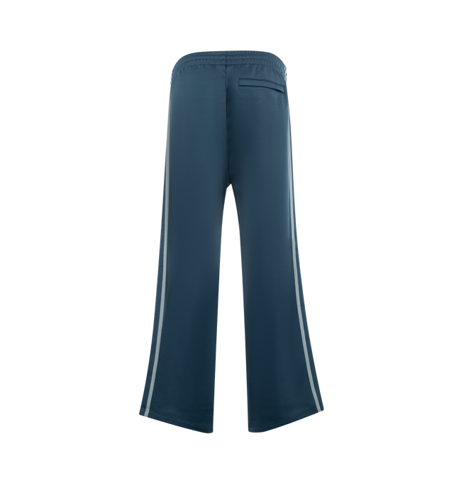 Image 2 of 3 - BLUE - CARHARTT WIP Bolar Sweat Pant featuring a loose fit, midweight, unbrushed polycotton jersey, knitted tape detailing on each leg, zipped pockets on the front and back and an embroidered Script Logo. 64% polyester, 36% cotton.