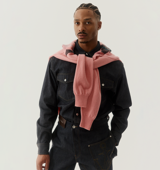 Image 2 of 3 - PINK - JW ANDERSON JWA X Pringle Polo featuring knitted argyle polo top in Scottish spun wool, a relaxed fit, rib trims, a three-button placket with horn buttons, and custom JW Anderson colouration. 100% wool. Made in Scotland as part of the Pringle collaboration.