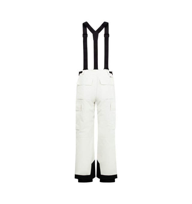 Image 2 of 3 - WHITE - MONCLER GRENOBLE GORE-TEX Laminate Padded Ski Bib featuring 2L GORE-TEX laminate, stretch technical polyester lining, Primaloft Active Insulation, heat-sealed seams, adjustable suspenders, YKK AquaGuard Highly Water Resistant zipper and snap button closure, pockets with YKK AquaGuard Highly Water Resistant and strap closure, powder cuffs, ski cut hem protection, RECCO reflector and silicone logo patch. 100% polyester. 
