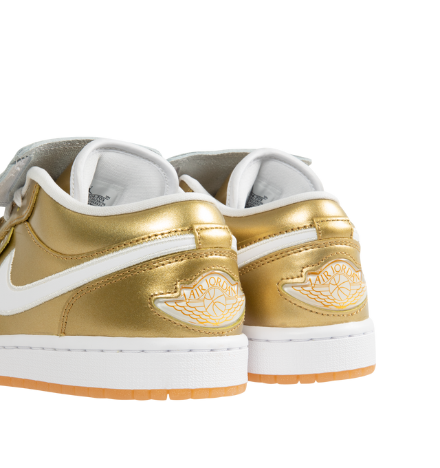 Image 3 of 5 - GOLD - JORDAN Air Jordan 1 Low Sneaker featuring encapsulated Air-Sole unit, genuine leather in the upper, lace up closure and solid rubber outsole. 