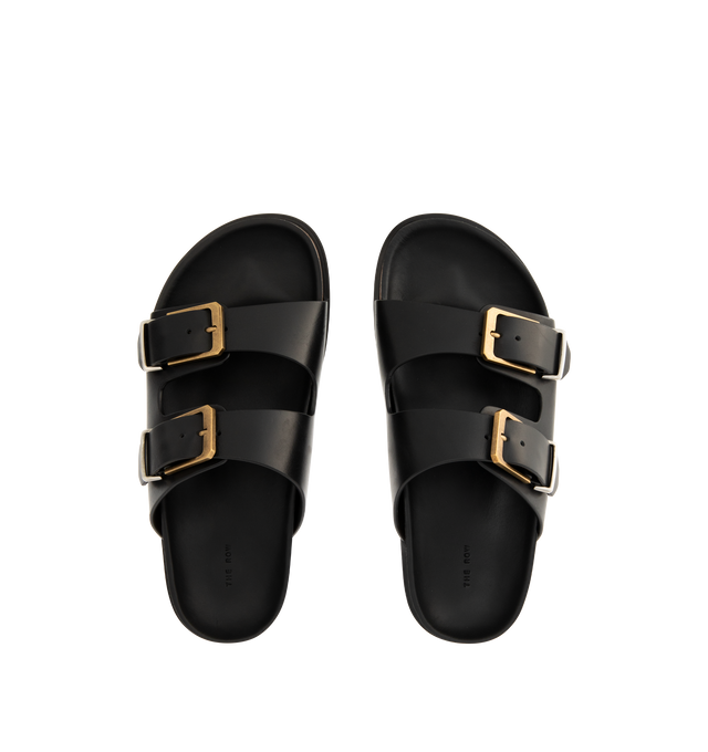 Image 4 of 4 - BLACK - THE ROW Buckle Slide featuring double-strap sandal in natural calfskin suede with adjustable straps, custom two-tone metal buckles, and contoured footbed in lightweight cork with durable rubber sole. 100% calfskin leather. Made in Italy.