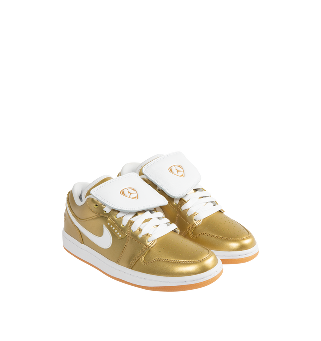 Image 2 of 5 - GOLD - JORDAN Air Jordan 1 Low Sneaker featuring encapsulated Air-Sole unit, genuine leather in the upper, lace up closure and solid rubber outsole. 