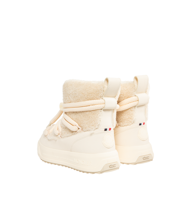 Image 3 of 4 - WHITE - MONCLER Altive Mid Snow Boots featuring nylon and textured rubber upper, mesh insole, drawstring fastening, TPU sole and Vibram Megagrip rubber tread. 16 cm calf length. Sole height 4.2 cm. 87% polyamide/nylon, 13% elastane/spandex; Lining: 100% polyamide/nylon. Sole: 100% elastodiene.