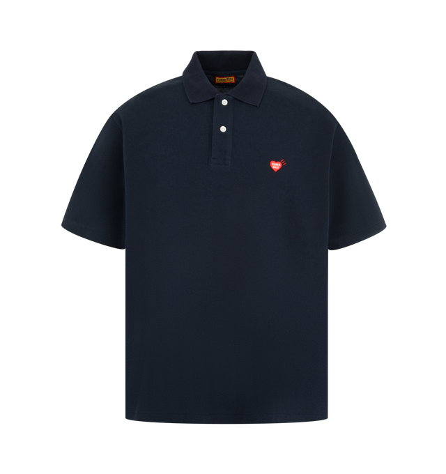 Image 1 of 2 - NAVY - HUMAN MADE Polo Shirt featuring a wide fit, single heart patch on the left chest, short sleeves, polo collar and shell-like buttons with the brand logo. 100% cotton. Made in Japan.