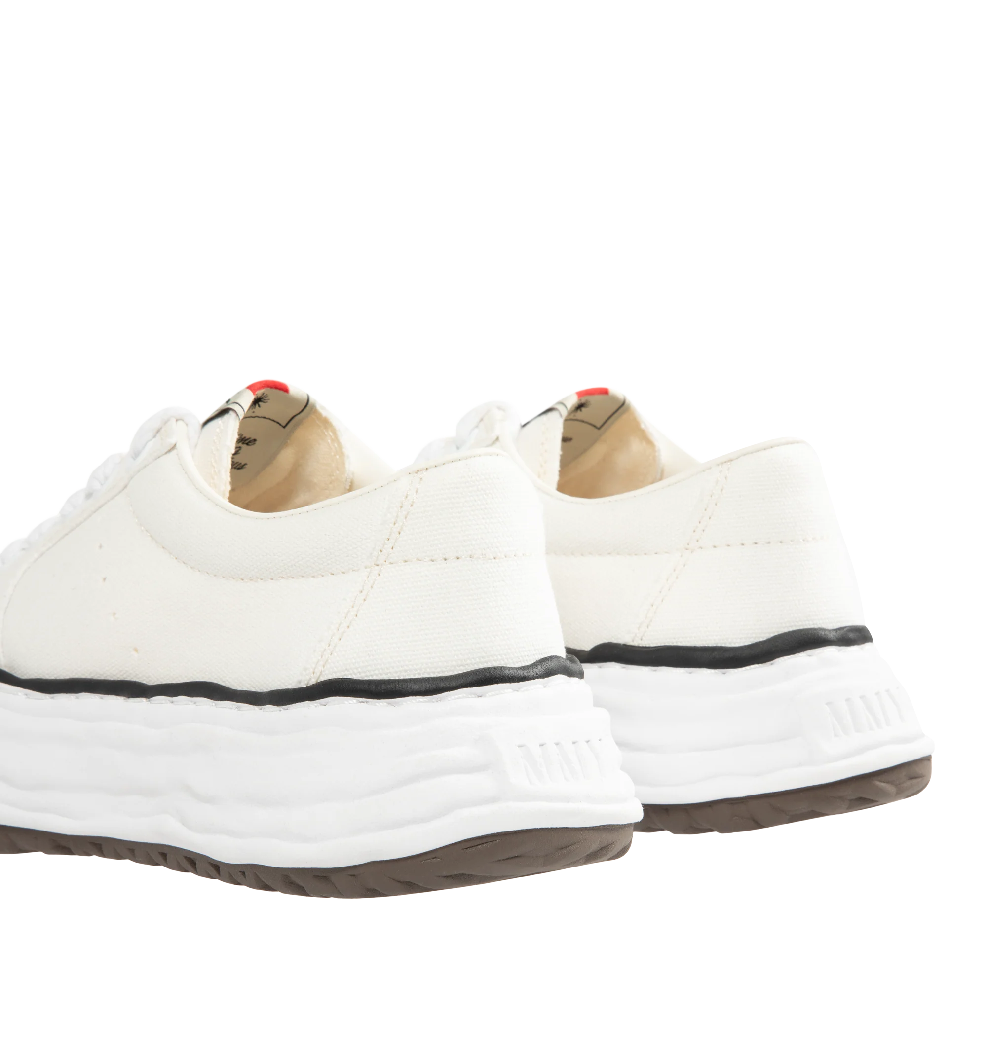 Image 3 of 5 - WHITE - Maison Mihara Yasuhiro Men's Eric Sneakers feature the brand's signature hand-sculpted OG sole, a mixed-material suede and canvas upper, and distinctive toe stitching for a bold contemporary look. Designed for the Spring/Summer 2026 collection, these designer low-top sneakers combine Maison Mihara Yasuhiro's experimental aesthetic with everyday comfort, while the handcrafted-inspired sole and intentional vintage detailing create a truly distinctive silhouette. Main Material: Cow Leath