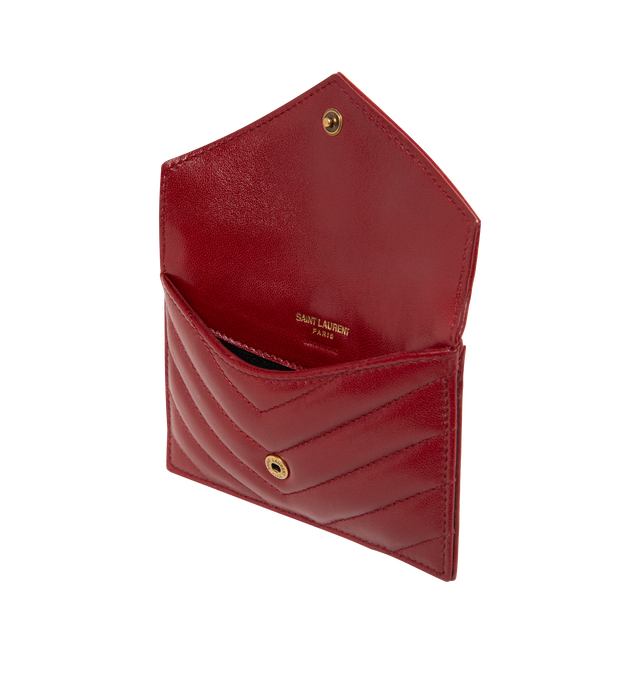 Image 3 of 3 - RED - SAINT LAURENT Flap Card Case in lambskin featuring zip card holder with flap, logo on front, quilted topstitching, bronze-tone hardware, snap-button closure, five card slots, one zip pocket and one flat pocket. 5.1" x 3.1" x 0.8". Lambskin. Made in Italy.
