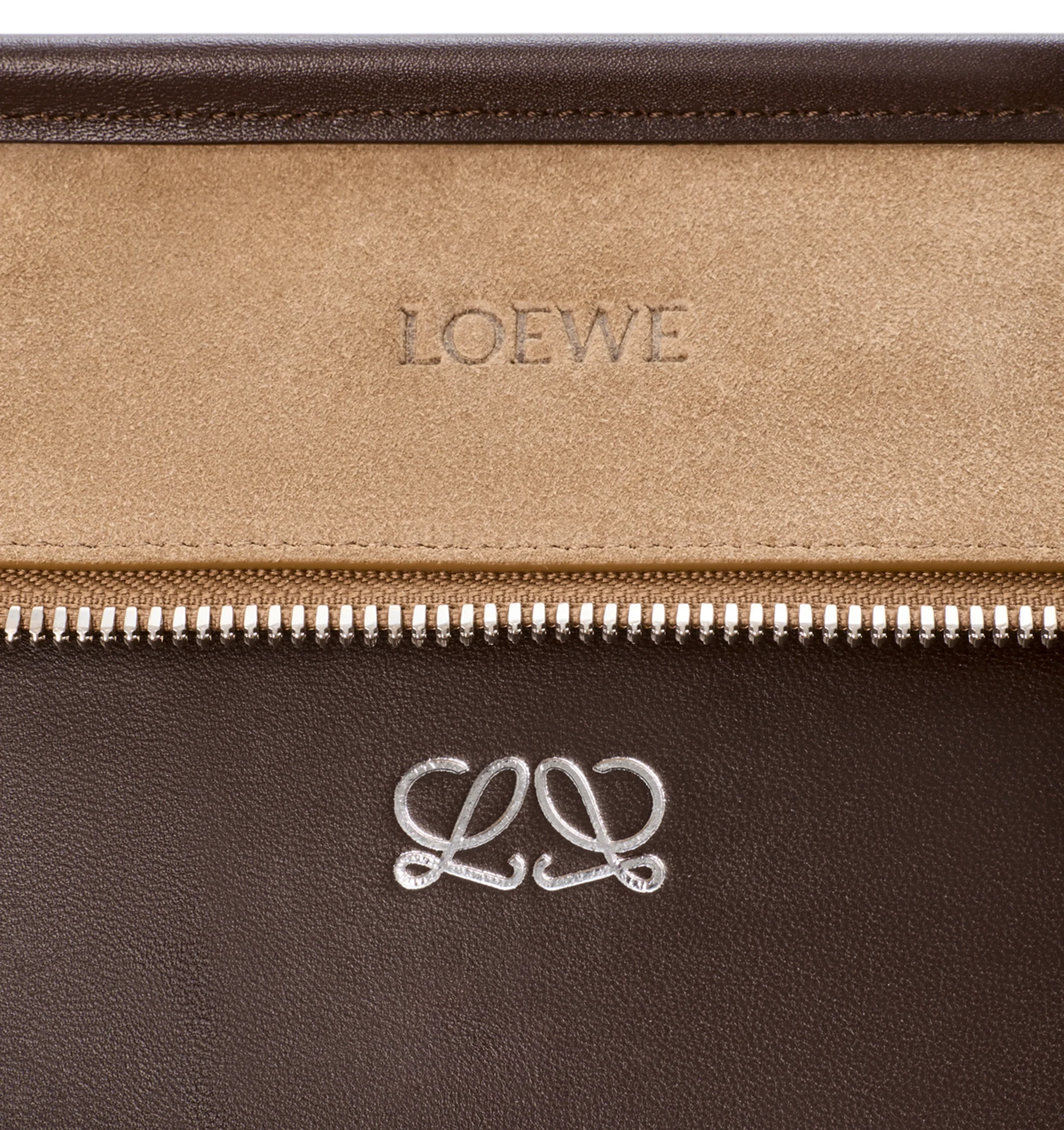 Image 13 of 16 - BROWN - Loewe Mens Amazona 180 XL Bag is crafted from suede with soft calfskin details. Features a relaxed silhouette, single toron top handle, removable shoulder handle, adjustable crossbody strap, zip closure with two leather pullers, two compartments with concealed magnetic closure, interior flat pocket, side D-ring, suede and nappa lambskin lining, palladium-tone hardware, and embossed LOEWE and Double L branding. Dimensions: 40 31 16 cm; Strap Length: 105133 cm; Strap Drop: 4761 cm;