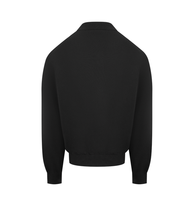 Image 2 of 2 - BLACK - THE ROW Kirin Polo featuring long-sleeved polo top in lightweight organic cotton jersey with boxy fit, single horn button closure, and ribbed collar, cuffs, and hem. 100% cotton. Made in Italy.