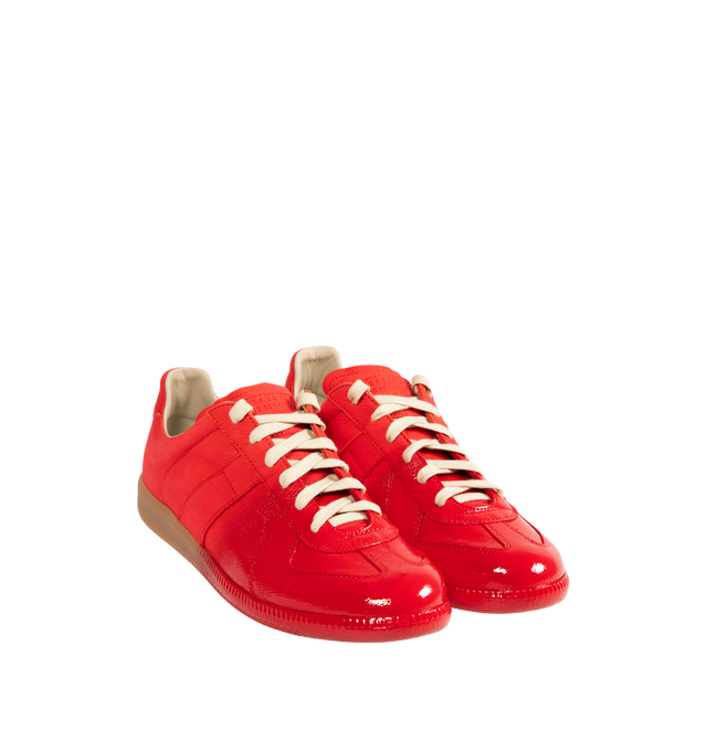 Image 2 of 5 - RED - MAISON MARGIELA High Quality Luxury Sneakers featuring classic low-top silhouette, contrast of matte leather and a patent sprayed finish, streamlined sole, traditional lace-up construction and signature single white stitch. 100% calf leather. Made in Italy. 