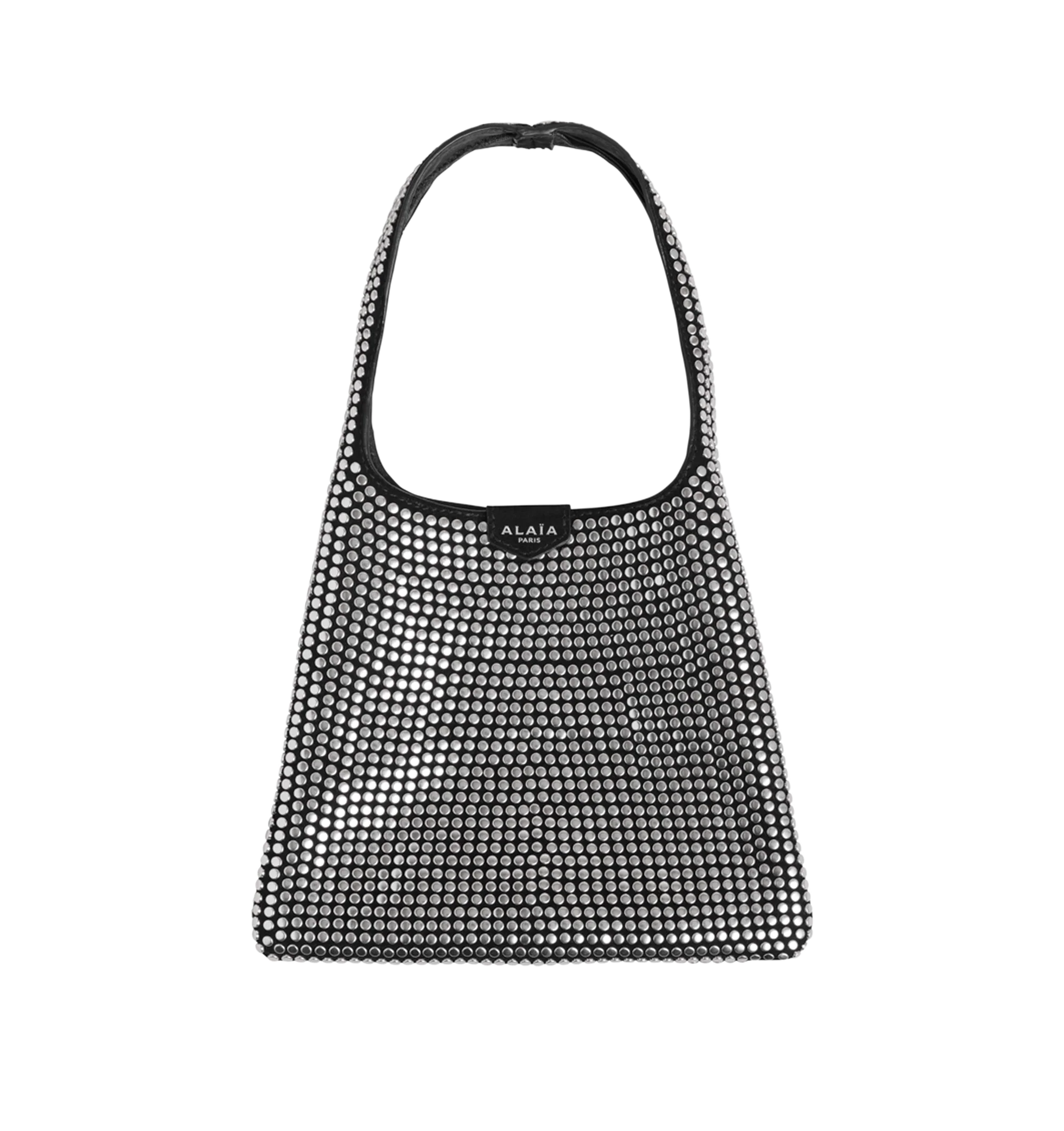 Image 1 of 1 - BLACK - Alaia Small Hobo Studs Bag features sequin-embellished calf leather exterior with calf leather lining. The compact shoulder bag features a sleek hobo silhouette, an interior magnetic top closure, and a short shoulder strap with a 4-inch drop for effortless carry. Dimensions: 8.3" W x 6.9" H x 0.4" D. This slim bag is ideal for essentials such as a phone, card holder, keys, and a few small personal items. Made in Italy.