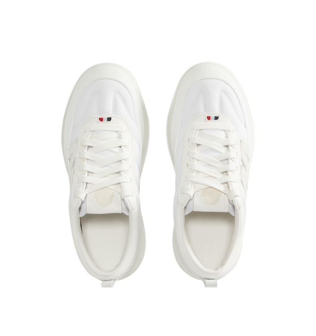 Image 5 of 5 - WHITE - Moncler Mens Altive Sneakers feature a nylon, nubuck, and suede upper. Designed with a lace-up closure, leather lining, OrthoLite insole, foam padding, EVA midsole, TPU spoiler, and Vibram rubber tread. Upper: Cow Leather and 100% Polyamide/Nylon; Lining: Cow Leather and 100% Polyamide/Nylon; Sole: 100% Elastodiene. Sole Height: 4.2 cm. Made in Vietnam. 