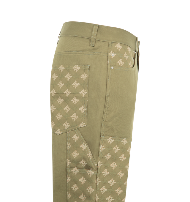 Image 3 of 3 - GREEN - Amiri Mens MA Quad Cotton Carpenter Jeans are crafted from cotton jacquard denim. Features custom-woven MA Quad monogram, classic five-pocket construction, contrasting front patch panels, carpenter hammer loop, and zip-fly with button closure. Main Material: 100% Cotton. Made in Italy. 
