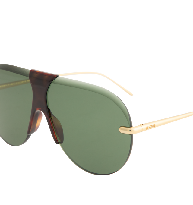 Image 3 of 3 - BROWN - LOEWE Slim Sunglasses featuring shield curved mask, metal stiches inspired by sewing stitches and Loewe logo lasered on the temples. UVA/UVB protection. Made in Italy.