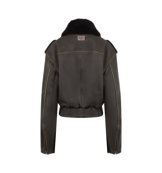 Image 4 of 5 - BROWN - ACNE STUDIOS Leather Bomber Jacket featuring soft lamb leather with a shearling collar, dropped shoulders with epaulettes, front flap pockets, side welt pockets, an elasticated hem, front snap button, zipper closure, zip sleeves, a metal logo plaque at the back neckline, relaxed fit and below-waist length. 100% Lamb leather. 100% Lamb shearling. Lining: 100% viscose. 