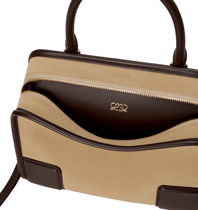 Image 12 of 17 - BROWN - LOEWE Small Amazona 180 Bag in suede featuring a relaxed silhouette anchored by a single toron top handle, designed to be carried open, while a concealed closure secures the main compartment, three carry options: short handle, removable shoulder strap and crossbody, zip closure with two leather zip pullers, two compartments, main compartment closed with magnetic closure, internal flat pocket, left side d-ring for customization, suede and nappa lambskin lining, embossed LOEWE and emb 