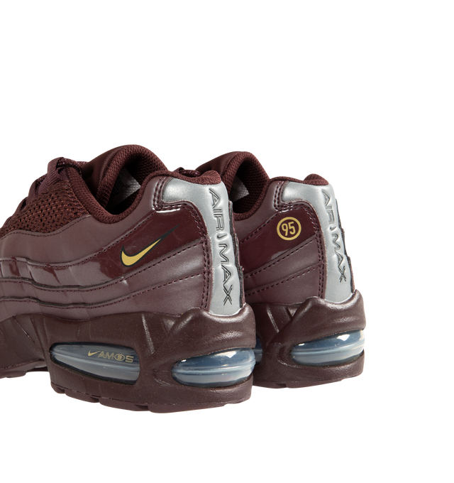 Image 3 of 5 - RED - NIKE Air Max 95 Big Bubble Sneaker featuring upper that mixes synthetic leather and textiles for a layered look, visible Max Air cushioning, flex grooves in the midsole and outsole, foam midsole and rubber outsole.