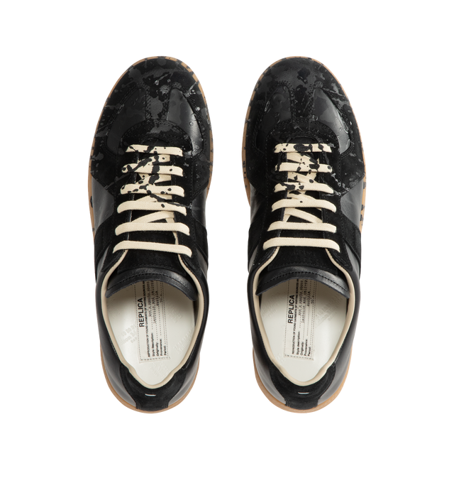 Image 5 of 5 - BLACK - MAISON MARGIELA High Quality Luxury Sneakers featuring a classic low-top silhouette, contrast of matte leather and a patent sprayed finish, paint splatter detail, lace-up construction and rubber sole. Made in Italy.