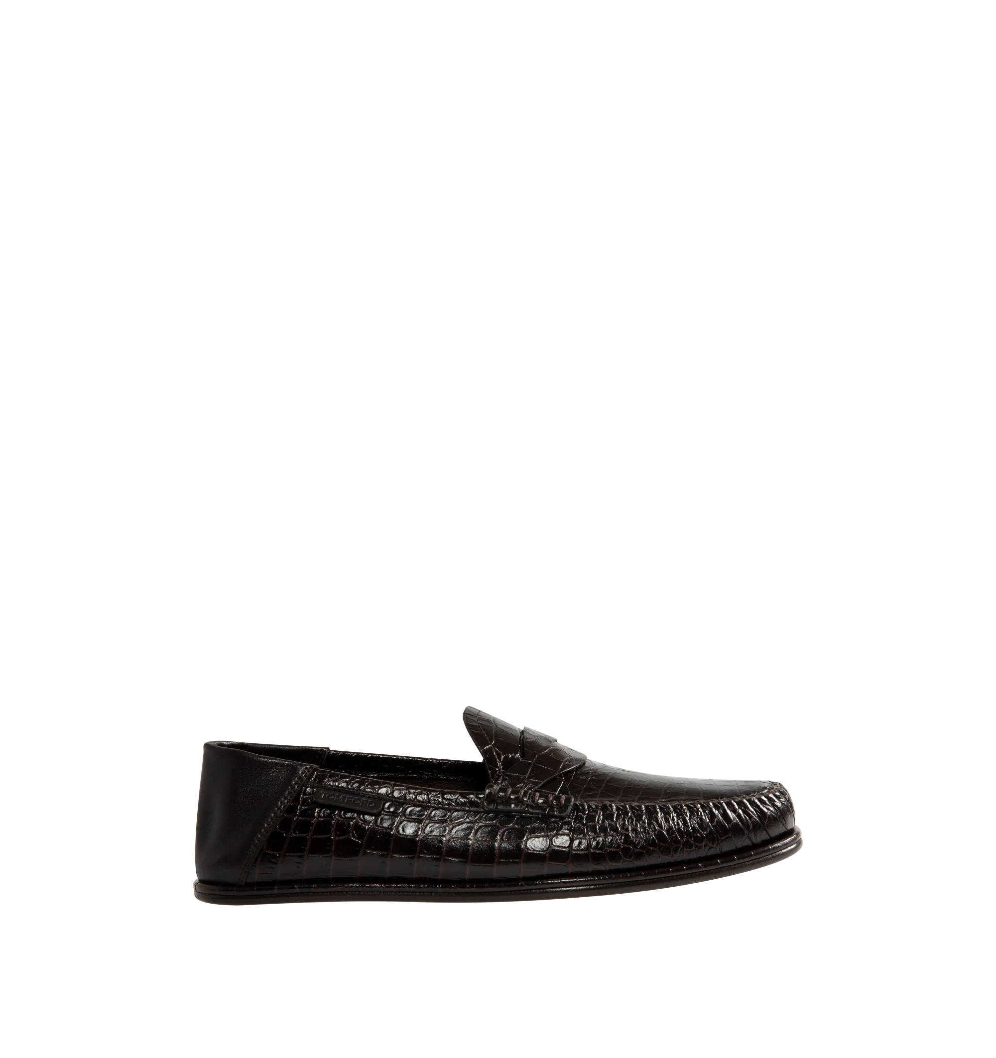 Image 1 of 5 - BROWN - Tom Ford Men's Soft Printed Alligator Sebastian Loafer is crafted from soft printed alligator-effect calf leather and features a distinctive twisted band detail. Designed as a soft loafer with a collapsible back, this versatile style can also be worn as a sabot. The refined silhouette is finished with a leather lining and a durable leather and rubber sole. Main Material: 100% Calf Leather. Lining: 75% Kid Leather, 25% Calf Leather. Sole: 70% Rubber, 30% Calf Leather. Made in Italy.