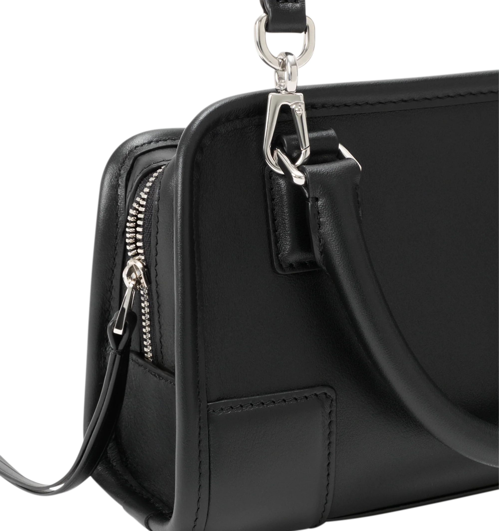 Image 11 of 11 - BLACK - Loewe Mini Amazona 180 Bag in leather features a relaxed silhouette anchored by a single toron top handle, designed to be carried open, while a concealed closure secures the main compartment, removable shoulder and crossbody straps, two carry options: short handle, removable and adjustable crossbody strap, zip closure with two leather zip pullers, two compartments, main compartment closed with magnetic closure, left side d-ring for customization, suede and nappa lambskin lining, and