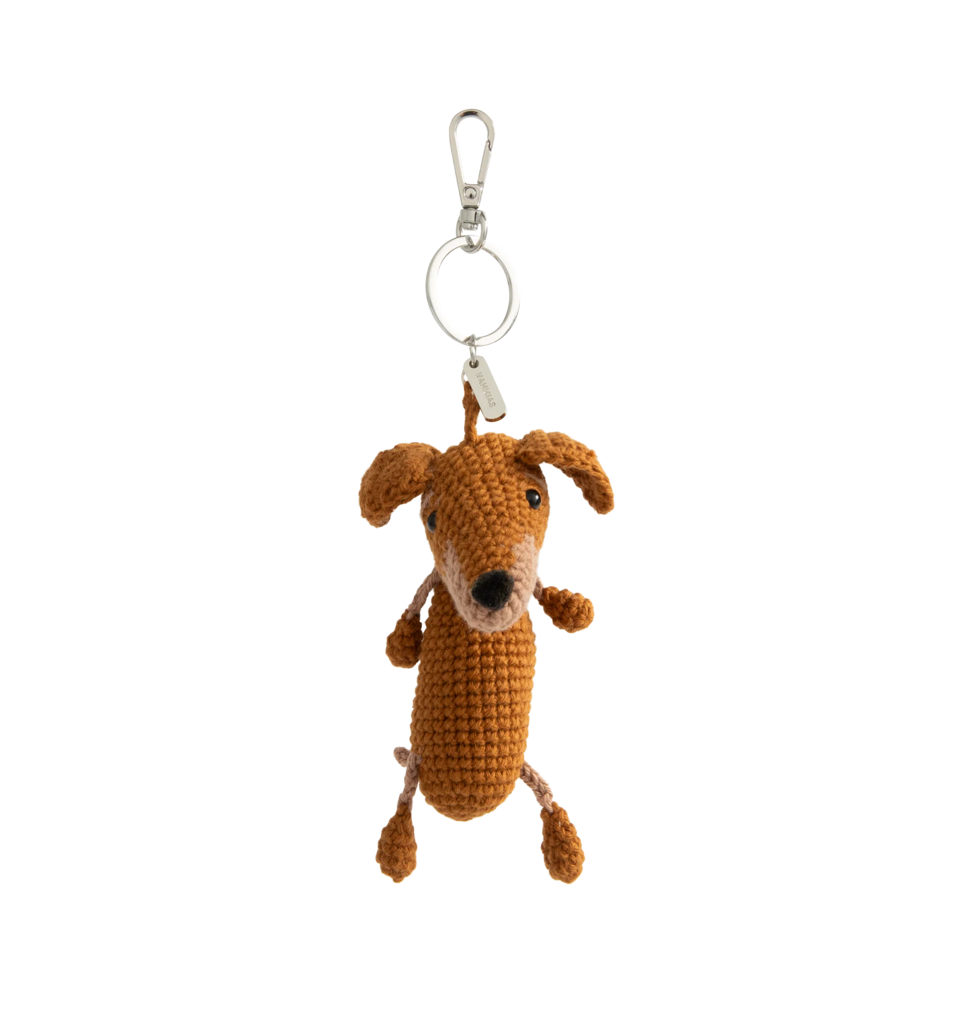 Image 1 of 2 - BROWN - Nahmias Roo Crochet Doxie Keychain is handcrafted in crochet. Features silver-tone hardware and a Nahmias logo tag. Main Material: Crochet. Hardware: Silver-Tone Metal. Imported
