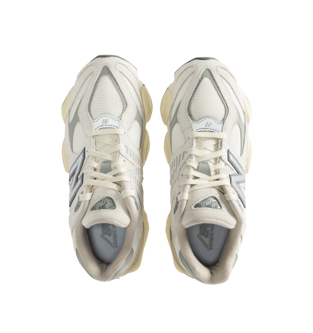 Image 5 of 5 - WHITE - New Balance 9060 Sneakers are a lace-up style with ABZORB midsole cushioning, ABZOB SBS heel cushioning, tongue logos, mesh and leather inserts, and diamond pattern outsoles.