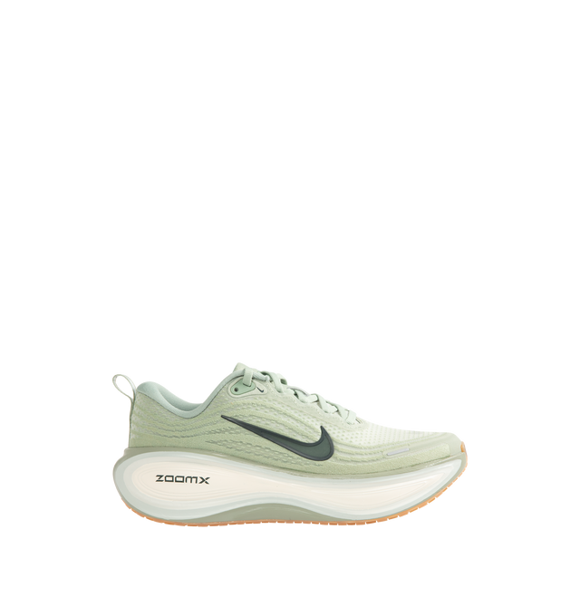 Image 1 of 5 - GREEN - NIKE Vomero Plus Sneaker featuring ultra-responsive ZoomX foam midsole, engineered mesh upper, high-abrasion rubber outsole, webbed lace loops for an adjustable fit and reflective details.
