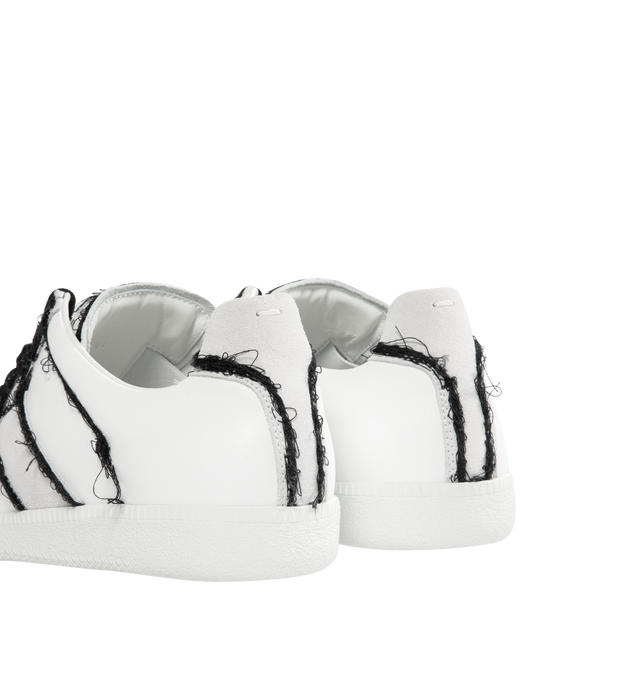 Image 3 of 5 - WHITE - MAISON MARGIELA High Quality Luxury Sneaker featuring smooth calf leather, distressed embroidery threads that trace the outline of each seam, lace up closure and white stitch appears at the back.? 100% calf leather. Sole: 100% rubber. 
