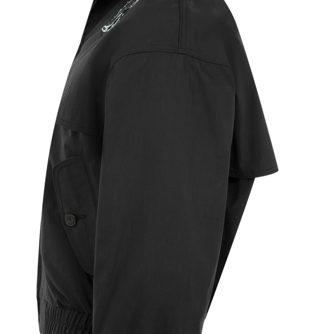 Image 3 of 3 - BLACK - ENFANTS RICHES DEPRIMES Serge Track Jacket featuring zip front closure, Japanese cotton nylon gabardine, viscose lining, stand collar, panelled construction, flap pockets with button closure, elastic waistband and printed artwork.