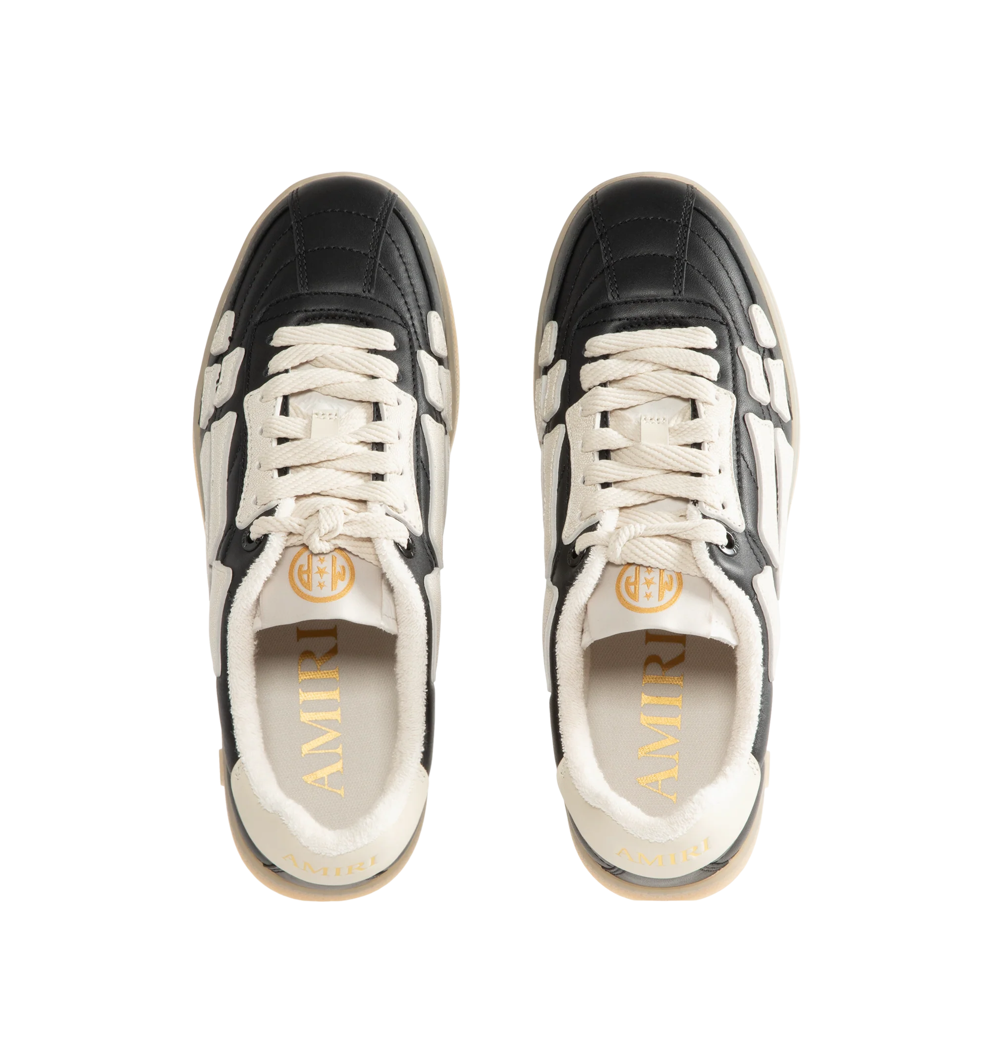Image 5 of 5 - BLACK - Amiri Mens Pacific Football Sneakers are crafted with a leather upper and signature pebbled leather bone appliqus. Feature contrast topstitching, lace-up closure, padded collar, two-tone rubber sole, and low-top silhouette. Main Material: Leather Upper; Sole: Rubber. Made in Vietnam.