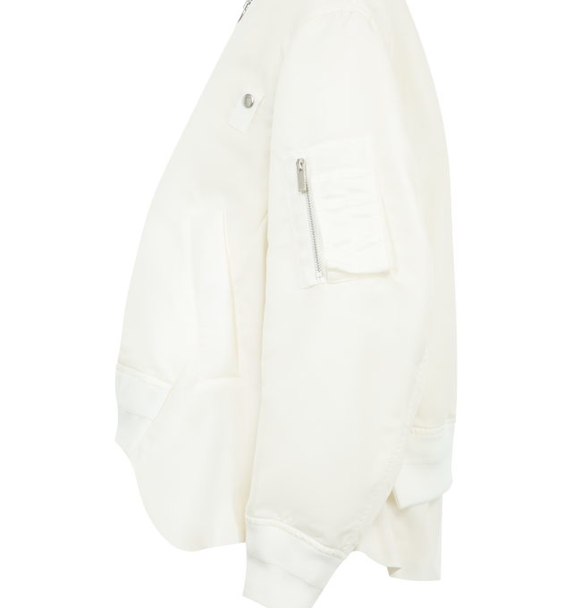 Image 3 of 3 - WHITE - SACAI Nylon Twill Wool Suiting Jacket featuring nylon satin bomber jacket, paneled construction, rib-knit stand collar, two-way zip closure, press-stud tabs at chest, cropped asymmetric hem and utility pocket at sleeve. Made in Japan.