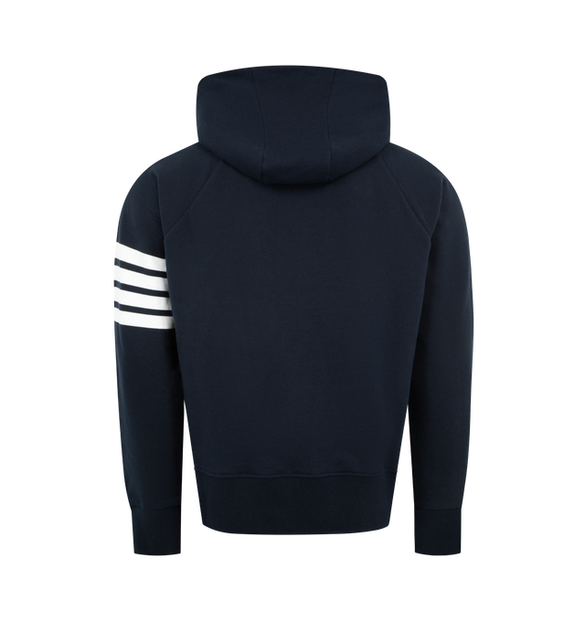 Image 2 of 3 - NAVY - THOM BROWNE Classic Loopback 4 Bar Zip Up Hoodie featuring brass 2-way zip closure, integrated hood with stripe trim, 4-bar stripe detail at left sleeve and kngaroo front pocket with name tag applique. 100% cotton. Made in Japan.