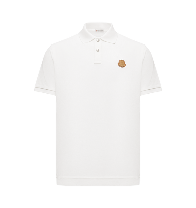 Image 1 of 1 - WHITE - MONCLER Logo Patch Cotton Piquet Polo Shirt featuring cotton piquet, collar with snap button closure, short sleeves, ribbed collar and cuffs and leather logo patch. 100% cotton. Made in Turkey.